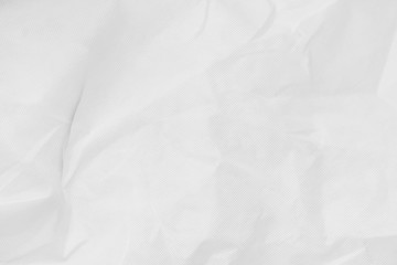 Crumpled white paper texture with dotted pattern, crumpled paper texture background