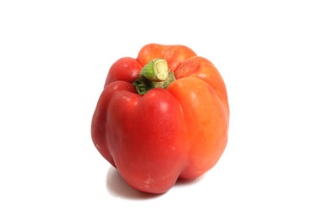 Red fresh bell pepper on background isolate.