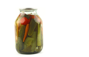 glasses jar with pickled vegetables, traditional russian marinated vegetarian meal for winter, copy space on the right