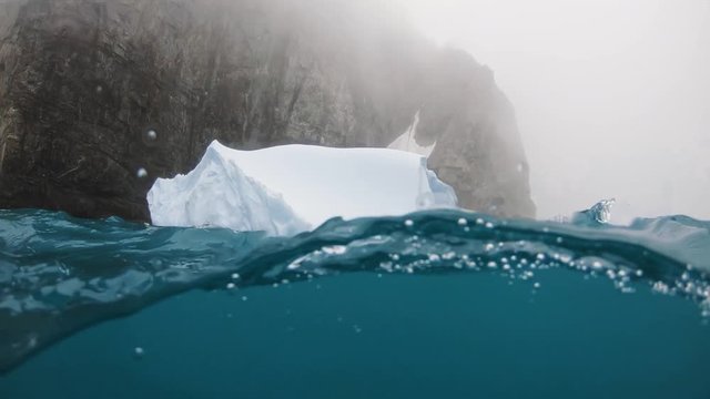 Antarctica Zodiac in Floating Ice Icebergs 50/50 underwater