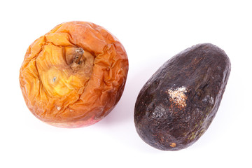 Old fruits with mold on white background, unhealthy food