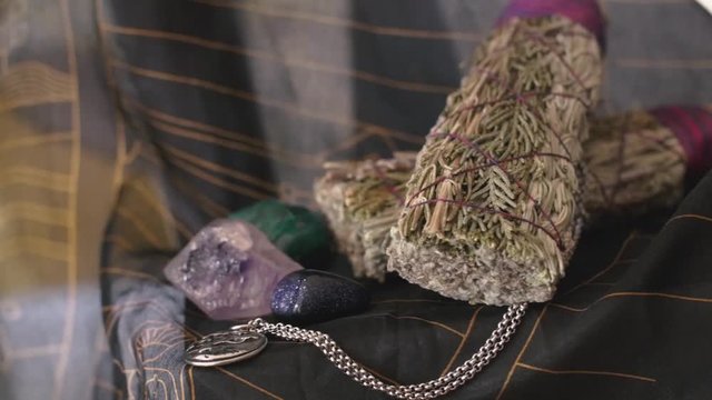 Wrap around sage and crystals focused on altar table