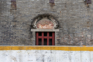 old door in the wall with decorative elements