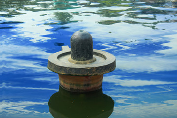 lord shiva linga in a water