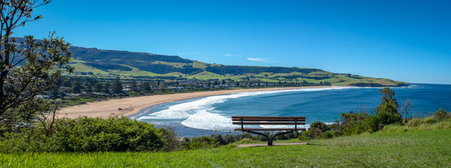 A restful bench with a panoramic view of Werri Beach, Gerringong, New South Wales, NSW, Australia
