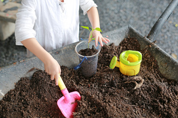 Hand children for tree planting