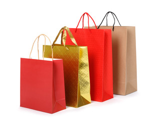 Group of color paper shopping bags isolated on white background, E-commerce digital marketing lifestyle Concept