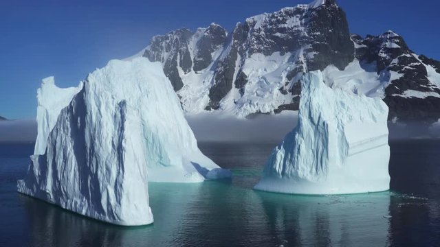 Antarctica Huge Icebergs and Mountain Ranges