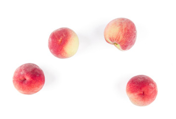 Overhead view of peaches isolated on white background
