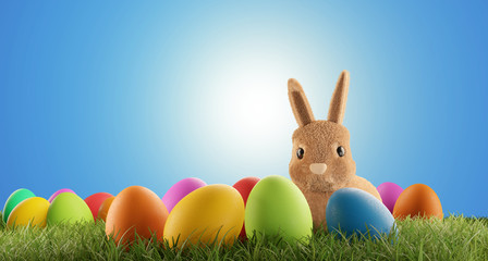 cute Easter bunny with eggs in grass 3d-illustration