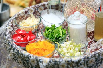  Fresh flowers potpourri sachet Thai traditional style. Flowers mixture in basket for spa and aromatherapy.