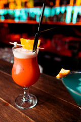 orange cocktail at the bar