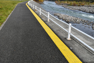 yellow pavement or Tactile Paving or Guiding Tiles to guide or warn the visually impaired...