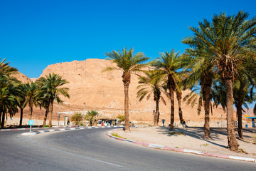 MASADA, ISRAEL - MARCH 22, 2019: Road entrance to Masada oasis is an ancient fortification in the Southern District of Israel situated on top of an isolated rock plateau