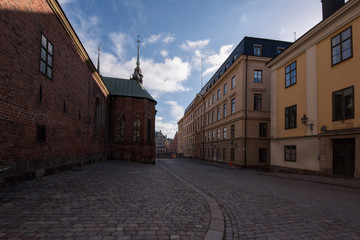 An sunny spring day at the Riddarholmen island in Stockholm with old courthouses and medieval church