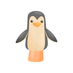 Doll penguin on hand on white background.