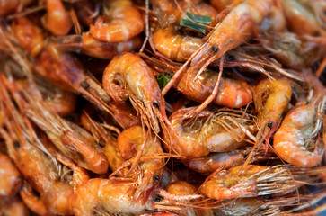 Street food fried and grilled shrimps.