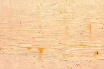 Wooden surface in old paint with smudges