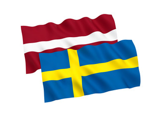 National fabric flags of Sweden and Latvia isolated on white background. 3d rendering illustration. 1 to 2 proportion.
