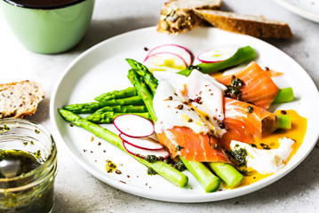 Smoked Salmon,Poached Egg on steamed Asparagus with Basil Pesto by Multigrain and seeds bread