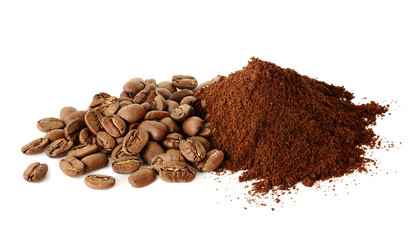Pile of Ground coffee and coffee beans isilated on white