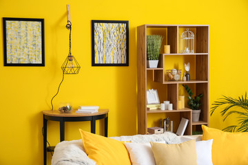 Stylish interior of room with new lamp hanging on wall