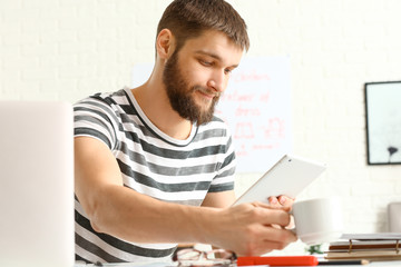 Male designer working in office