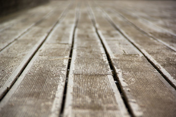 Weathered wooden floor board telling its story