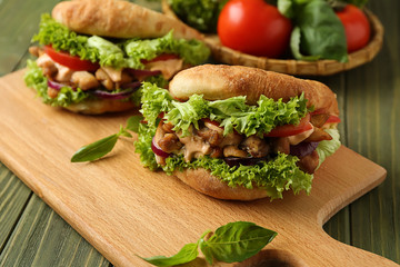 Tasty doner kebab on wooden board
