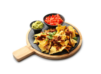 Board with tasty nachos, meat and sauces on white background