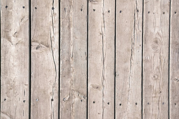 Old gray boards nailed. Texture can be used as a background for design and creativity