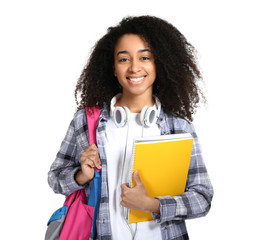 Beautiful African-American student on white background
