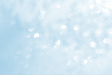 Abstract natural bokeh background in white and blue colors