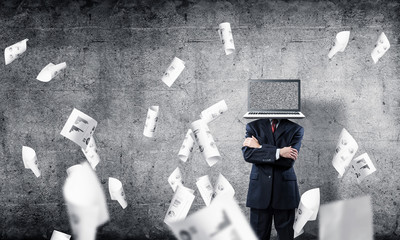 Businessman with laptop instead of head.