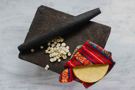 Traditional metate used to make maize flour for tortillas, pre-hispanic food