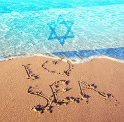 Beach sand, sea and flag Israel. I love Israel concept