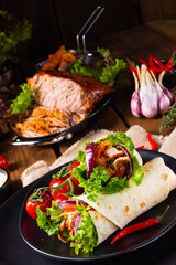 Tasty wraps filled with pulled pork and salad