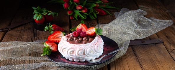 light pavlova with fresh fruits and chocolate
