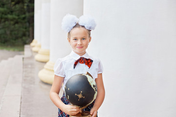 Portrait of beautiful young first-grader Farewell Bell. day of knowledge. beginning of the school...