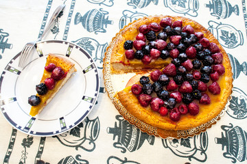 Slice, cake.Fresh dessert fruit tart covered in raspberries and blackberries