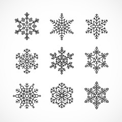 Set of simple vector snowflakes icons. Isolated on white background. For winter or christmas designs. 10 EPS illustration.