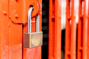 metal golden padlock on door