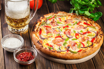 Homemade pizza with bacon, paprika and corn