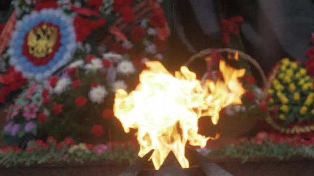 Victory Memorial to Soviet Army in Russia. Day, rain, may. Eternal flame. Close-up