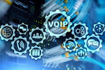 VoIP Voice over IP on the screen with a blur background of the server room. The concept of Voice over Internet Protocol