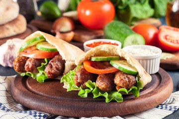 Cevapcici or cevapi served with pita bread