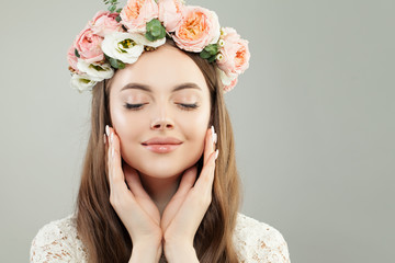 Portrait of Beautiful Young Model Woman with Healthy Clear Skin, Natural Makeup and Spring Flowers, Female Face Closeup