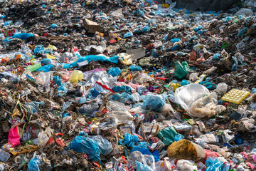 Pile of various domestic garbage in landfill