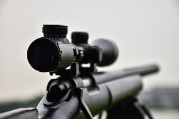 Rifle with a scope and bipod with first person shooter(FPS) view 
