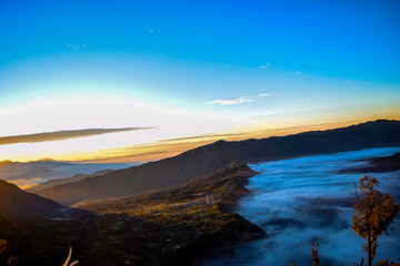 Beautiful colorful sunrise over Mount Bromo and wild island in Mount Bromo National Park
